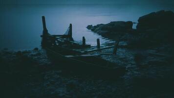 CGI Quiet evening by the water with an abandoned boat resting on the shore video