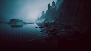 CGI Mysterious coastal landscape with fog and rugged cliffs reflecting on water video