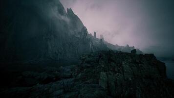 CGI Mysterious rocky landscape under cloudy sky in twilight hours video