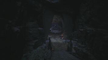CGI Mysterious cave pathway illuminated by faint light during evening hours video