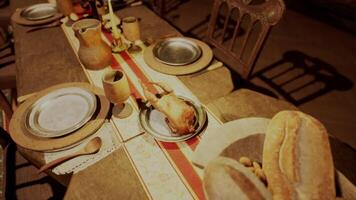 CGI A beautifully set rustic dining table featuring various food and drinks video
