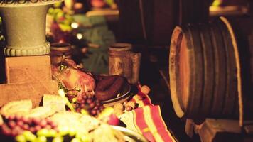 CGI A diverse array of food and drinks displayed on a rustic dining table at dusk video