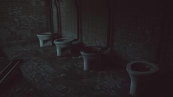 CGI Abandoned restroom with multiple toilets in dimly lit environment video