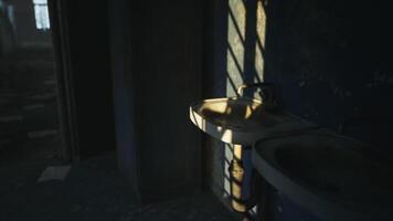 CGI Abandoned restroom with sunlight casting shadows on broken fixtures video