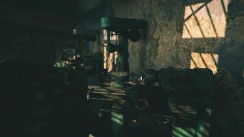 CGI Old workshop filled with machinery and shadows during sunset hours video