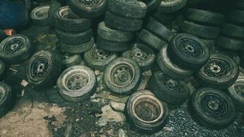CGI Abandoned tires stacked in a cluttered workshop creating a chaotic atmosphere video