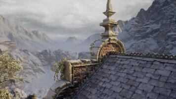 CGI Snow capped mountains and an ancient rooftop against a cloudy sky video