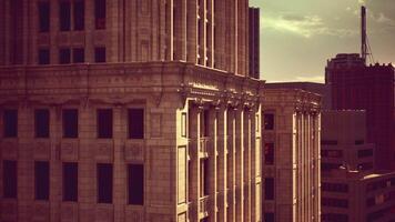 CGI Sunset light illuminating historic architecture in a bustling city skyline video