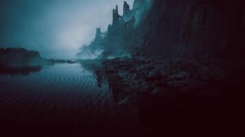 CGI Dark and mysterious cliffs rise above a still, reflective body of water video
