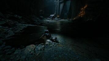 CGI Dead knight resting on stone floor within an ancient cave video