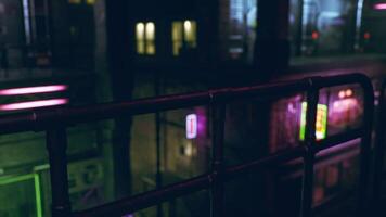 CGI Neon lights illuminate urban alleyway at night in vibrant city setting video