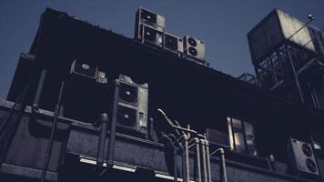 CGI Industrial building with air conditioning units and piping at twilight video