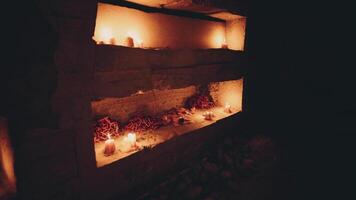 CGI Candles illuminate dark space in a traditional setting during a ritual video
