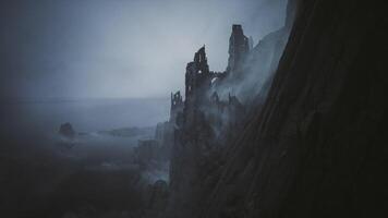 CGI Mysterious ruins rise above foggy coastline during twilight hours video