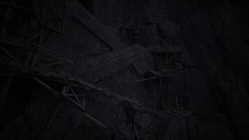 CGI Forgotten structure within dark quarry reveals signs of decay and neglect video