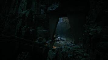 CGI Majestic stone archway in a dark cave illuminated by soft light video
