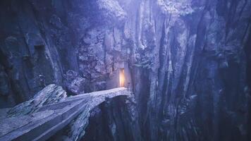 CGI Mysterious pathway leading to glowing entrance in rocky canyon at twilight video