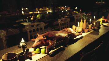 CGI Feast laid out on a rustic table with delicious food and drinks at night video