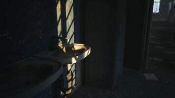CGI Sunlight casts shadows on an old sink in a dimly lit room video