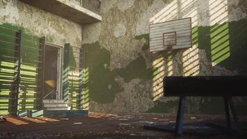 CGI Abandoned gymnasium with peeling paint and scattered debris in dim light video