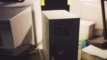 CGI Dimly lit workspace showcasing a computer tower and equipment video