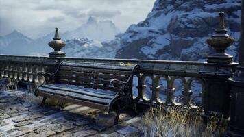 CGI Winter landscape with a rustic bench and snow covered mountains in view video