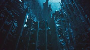 CGI Underwater cave with jagged rock formations illuminated by blue light video