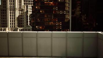 CGI View from a rooftop balcony overlooking city buildings at dusk video