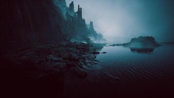 CGI Mysterious coastal landscape at twilight with fog and crumbling cliffs video