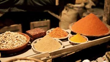 CGI Colorful spices and nuts at a bustling old national African market video
