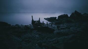 CGI Abandoned boat rests on the shore at twilight in a secluded location video