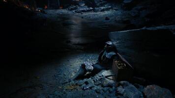 CGI Dead knight resting in a dark cave with ancient treasures surrounding him video