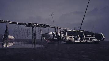 CGI Abandoned fishing boats near a foggy shore during twilight hours video