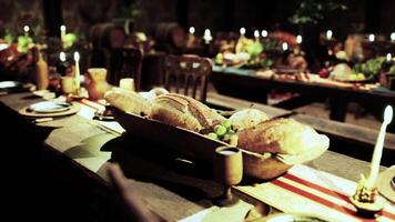 CGI A festive gathering featuring an abundance of food and drinks on a rustic table video