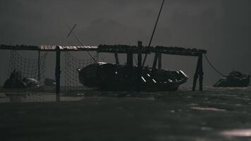 CGI Dark waters feature a small boat docked under a wooden pier at night video