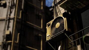 CGI Old air conditioning unit mounted on a weathered building exterior video