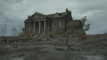 CGI Eerie abandoned mansion surrounded by barren landscape on a cloudy day video