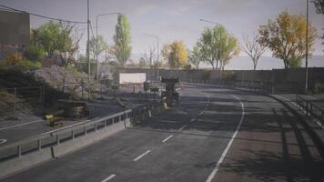 CGI Roadway construction area with equipment and trees in urban environment video