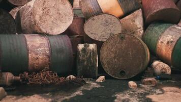 CGI Rusty barrels and debris scattered across a desolate landscape near a river video