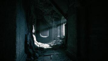 CGI Dark corridor with light rays illuminating ancient stone walls video