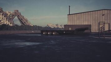 CGI Abandoned industrial area with shipping trailer and modern architecture at dusk video