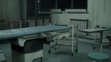 CGI Abandoned hospital with deteriorating surgical table and desolate atmosphere video