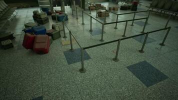 CGI Abandoned airport terminal with scattered luggage and empty waiting areas video