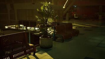 CGI Eerie abandoned airport terminal with dim lighting and empty benches video