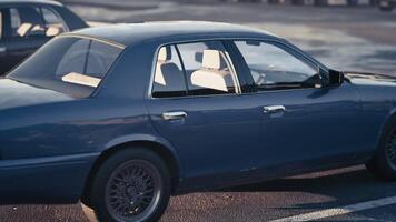 CGI Classic blue car parked in an empty lot during sunset with soft lighting video