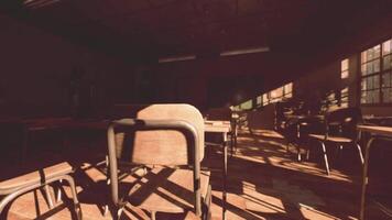 CGI Abandoned old school classroom with shadows casting on empty desks in sunlight video