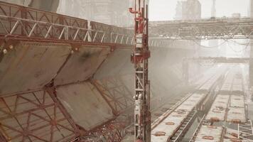 CGI Abandoned oil terminal with destroyed infrastructure and rusting machinery video