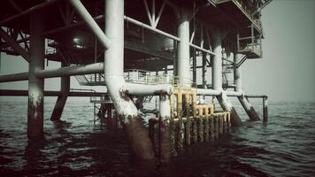 CGI Old oil platform structure submerged in water with rusted supports and pipes video