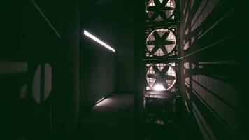 CGI Spacious corridor with dark concrete walls and air fans video