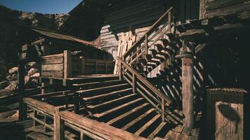 CGI Rustic wooden staircase leading to an old building in a desert landscape video